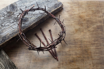 Wall Mural - Jesus Crown Thorns and nails on Old and Grunge Wood Background. Vintage Retro Style.