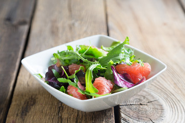 Wall Mural - Fresh salad with grapefruit pulp