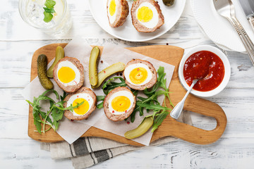 Meatballs with minced meat stuffed with boiled egg. 