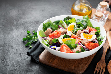 Wall Mural - Tuna Fish Salad with Lettuce, Cherry Tomatoes, egg and olives.