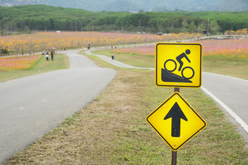 Warning bicycle road signs downhill with bicycle lane on the hill with copy space , Road sign for bike, Downhill bike sign