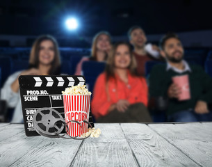 Canvas Print - Young people watching movie in cinema theatre