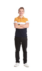 Portrait of handsome teenage boy on white background