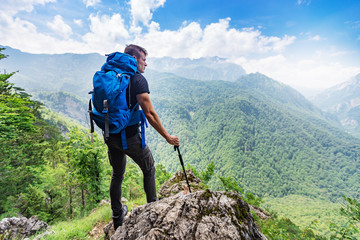 Rear view of successful hiker,enjoying breathtaking view