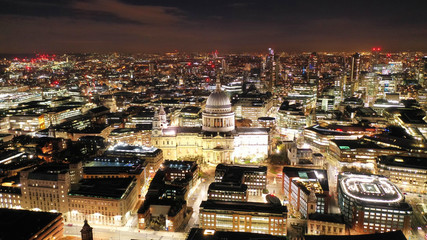 Wall Mural - Aerial drone night shot of iconic landmark   Saint Paul Cathedral in the heart of City financial district of London, United Kingdom