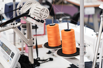 Aufkleber - Multi-colored thread roll.Computerized embroidery machines.