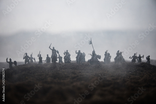 Photographie Medieval battle scene with cavalry and infantry