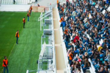 Wall Mural - Blurred crowd of spectators on a stadium