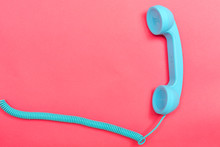 Retro Phone On A Pink Paper Background