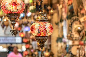 Wall Mural - Traditional bright decorative hanging Turkish lamps and colourful lights with vivid colours  in the Istanbul Bazaar, Turkey