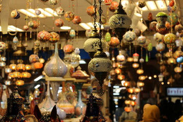 Wall Mural - Traditional bright decorative hanging Turkish lamps and colourful lights with vivid colours  in the Istanbul Bazaar, Turkey