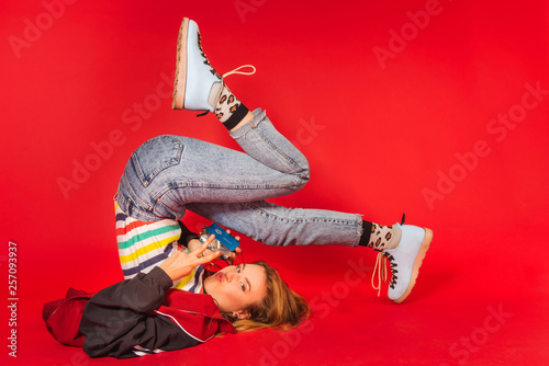Plakat Fashion portrait of trendy young woman in retro style clothes