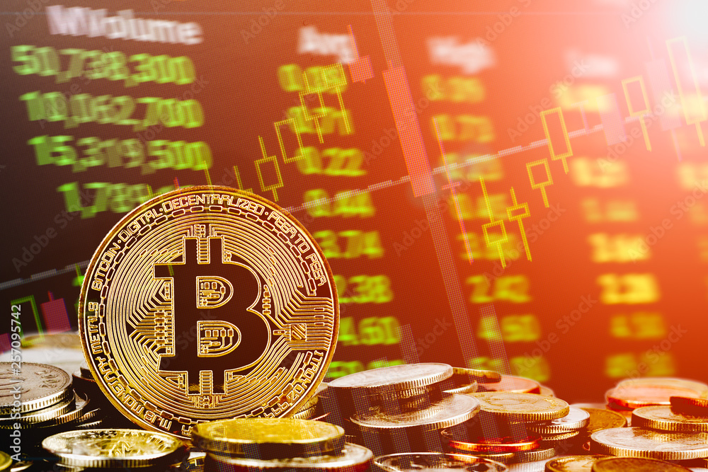 Bitcoin cryptocurrency stock trading background concept. Golden bitcoin over many international money coins with abstract trading green market data chart background.
