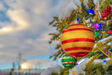 Tree decorated with baubles and Christmas lights