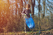 © Daniel CHETRONI - Recycle waste litter rubbish garbage trash junk clean training. Nature cleaning, volunteer ecology green concept. Young men and boys pick up spring forest at sunset. Environment plastic pollution