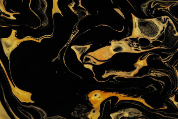 Wall Mural - Black and gold marble texture design for packaging, cover, brochure, poster, wallpaper, presentation, invitation, textile, decor. Abstract modern background. Liquid acrylic painting. Fluid art