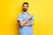 © luismolinero - Surgeon doctor man holding a hot cup of coffee