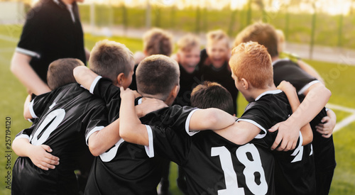 Junior Sport Team Spirit. Boys Sport Team Huddle. Coaching Youth Football Team