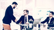 © yurolaitsalbert - handshake Manager and the client before signing a contract in the workplace in a modern office