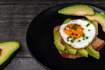 Wall Mural - On the plate is a fried egg. Food for all