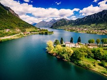 Aerial View Of Lake Idro Near Garda In Italy. Beautiful Summer Landscape With Lake Between Mountains In Italy.