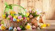 Easter composition spring flowers  and colorful Easter eggs in basket.
