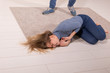 © satura_ - people, abuse and violence concept - woman threatened by husband lying on floor