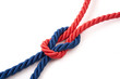 © piotrszczepanek - Czerwona i niebieska linka związane na białym tle