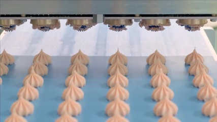 Poster - Cooking many sweet meringue on blue production line. sweet food concept.