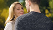 © motortion - Smiling woman looking at beloved man, dating agency website, togetherness
