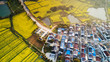 © 公 郎 - Nanjing, jiangsu, China: aerial photo of yaxi's 'international slow city' in a sea of rape flowers covering 10,000 mu