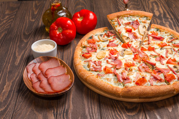 Poster - Delicious pizza with ingredients served on wooden table