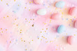 canvas print picture - Easter composition. Easter eggs, confetti on unocorn background. Flat lay, top view, copy space
