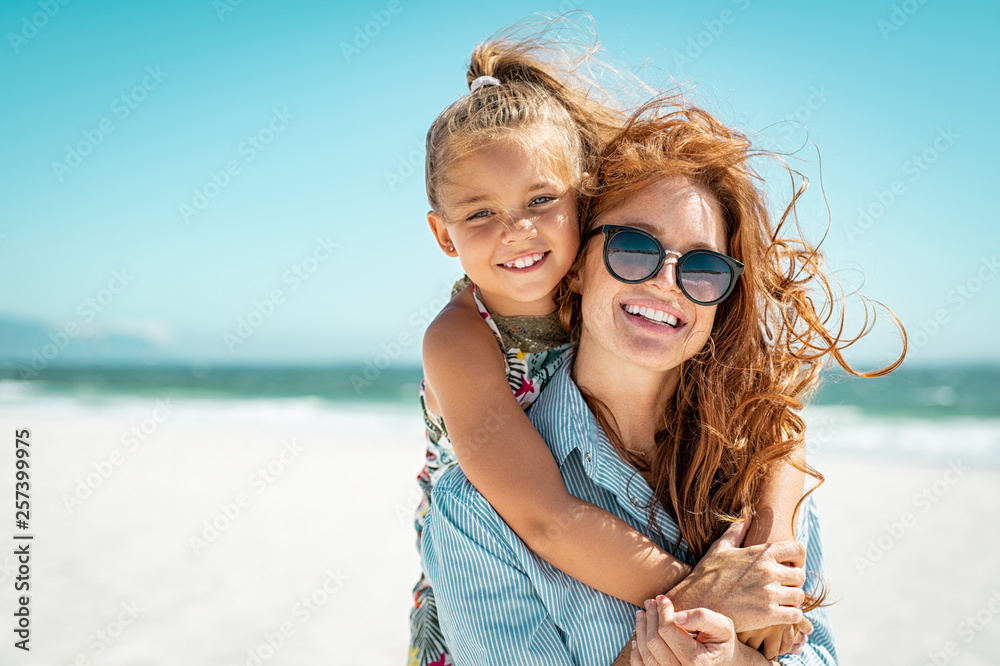 Mother with daughter at beach