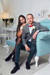 portrait of young people. girl with boyfriend flirting. photography Studio