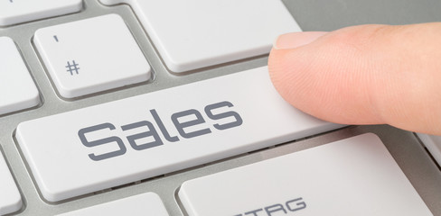 Wall Mural - a keyboard with a labeled button - sales