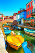 Colorful houses on the canal in Burano, Venice, Italy
