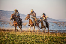 Cowboy And Horse  At First Light,mountain, River And Lifestyle With Natural Light Background