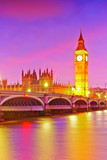 Fototapeta Big Ben - View of the Houses of Parliament and Westminster Bridge along River Thames in London at dusk.