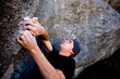 © Cavan Images - A male climber works a boulder problem called Toilet Brush (V1) on April 22, 2007 in Quantum Field, at Castle Hill, Canterbury, New Zealand.  He worked this problem for two days but was not able to finish the problem due to the difficulty.  Toilet Brush was a very underrated problem and should be a several grades higher than its current rating.