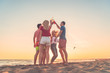 © Addy - Group of friends enjoy on the beach