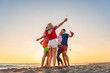 © Addy - Group of friends enjoy on the beach