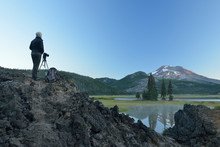 Girl Taking Photos With Canon Camera At Sparks Lake, Central Oregon, USA 