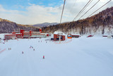 Fototapeta  - Cable car sky on snow mountain at Sapporo Kokusai, Hokkaido, japan.