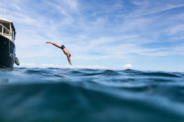 Croatia, istria, Pula, senior jumping into the sea