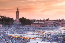 People At Jemaa El-Fnaa Square And Koutoubia Mosque In The Background