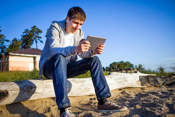 Sticker - Young Man with a Tablet