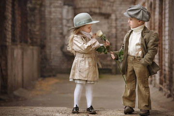 Romantic meeting of two children in the old town