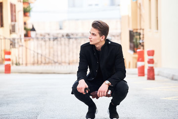 Wall Mural - Handsome young man in black