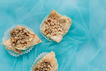 Wall Mural - Baklava dessert. Pastry made of layers of filo filled with chopped nuts and sweetened and held together with syrup or honey